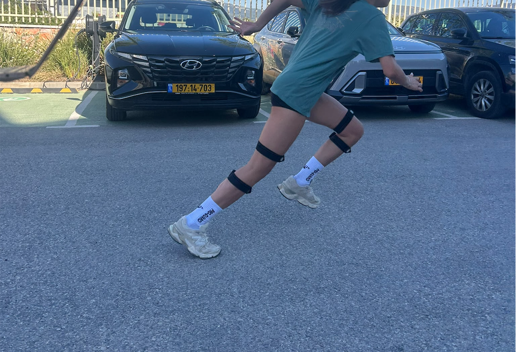 Athlete in rehab wearing TropX knee sensors